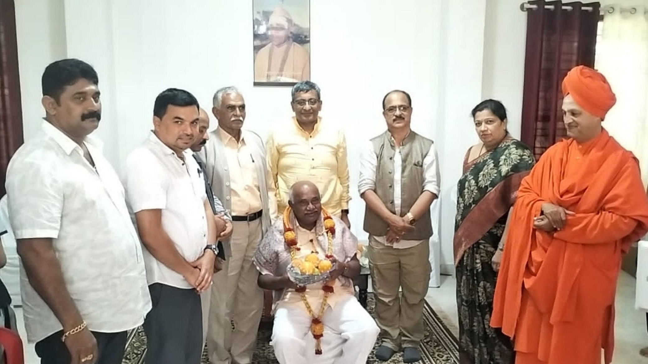 <div class="paragraphs"><p>MLC Adaguru H Vishwanath, also known as 'Halli Hakki', was felicitated at Arameri Kalancheri Mutt in Virajpet on Saturday, as Mutt pontiff Shanthamallikarjuna Swamiji looks on among others.</p></div>